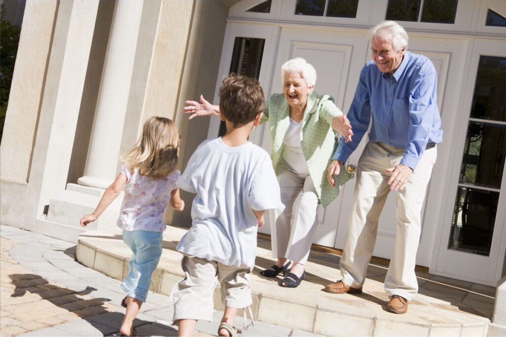 Grandparents greeting grandchildren
