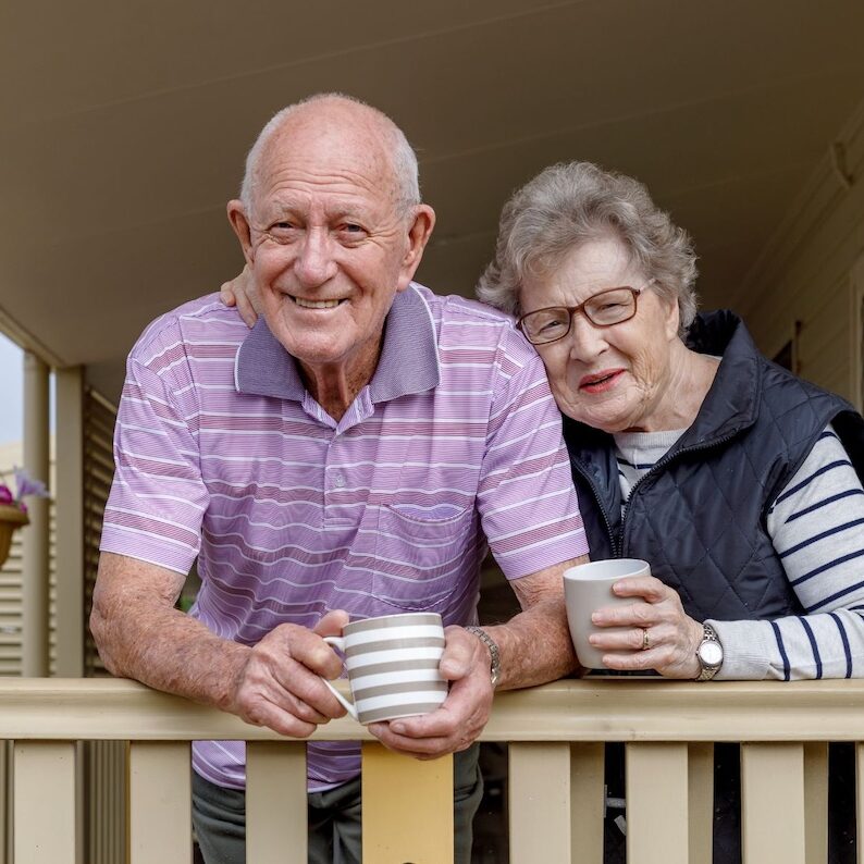 Untitled design – 1 Senior couple on front porch
