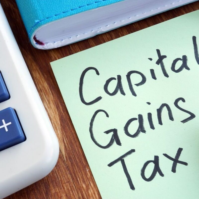 1 post it note with Capital Gains Tax